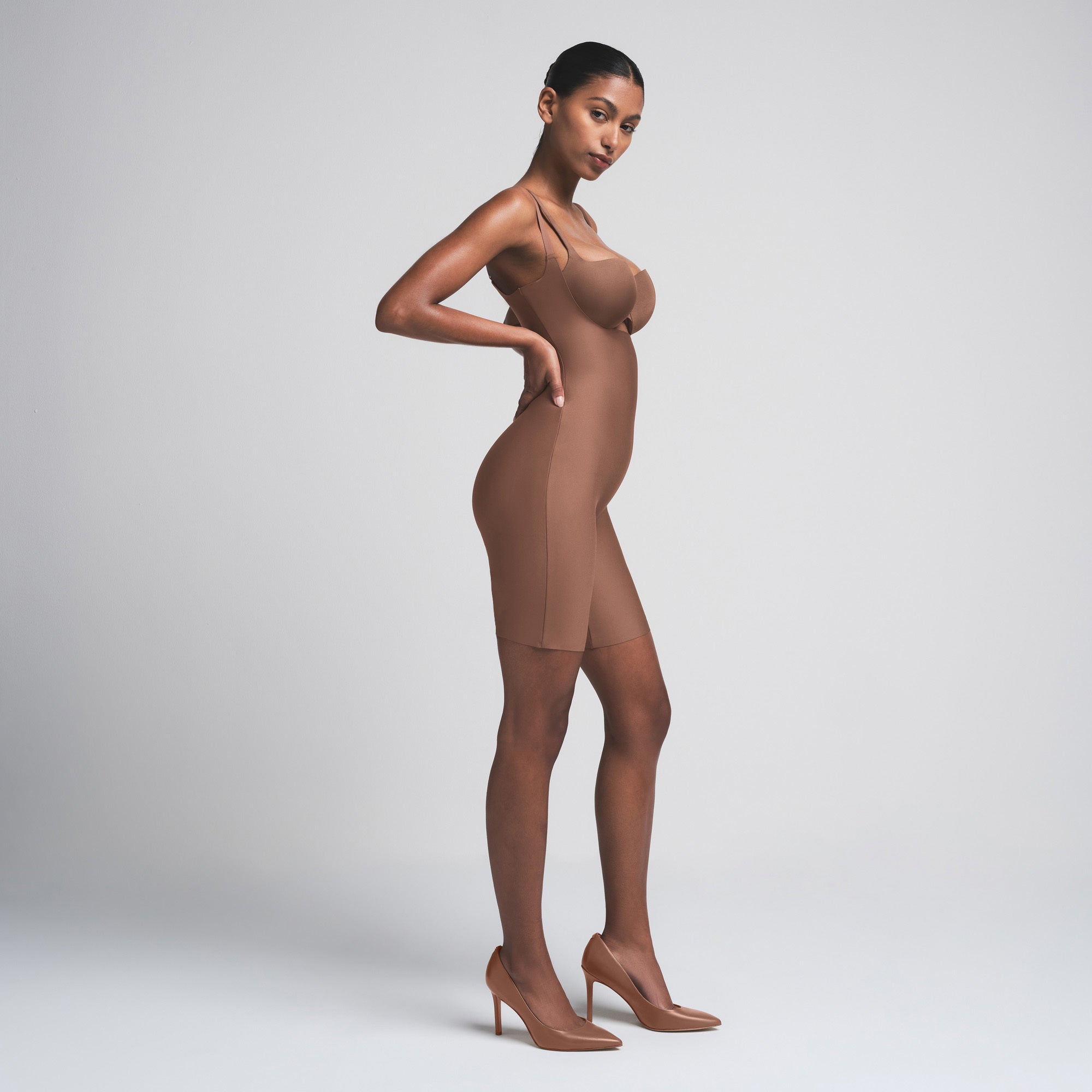 SKIMS BODY BUTT ENHANCING OPEN BUST PADDED BODYSUIT | JASPER