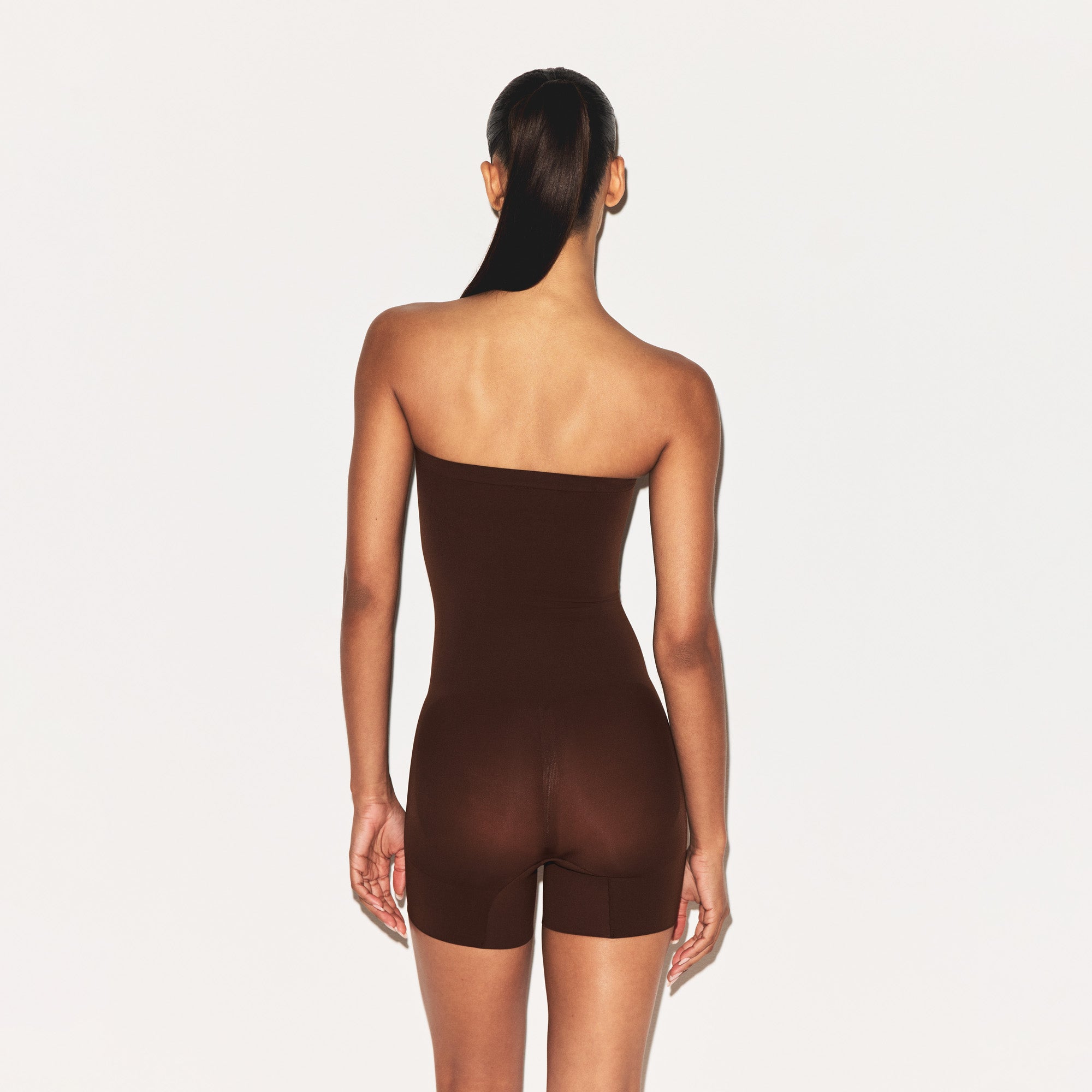 SHEER SEAMLESS STRAPLESS SHORTIE BODYSUIT | COCOA - Image 3
