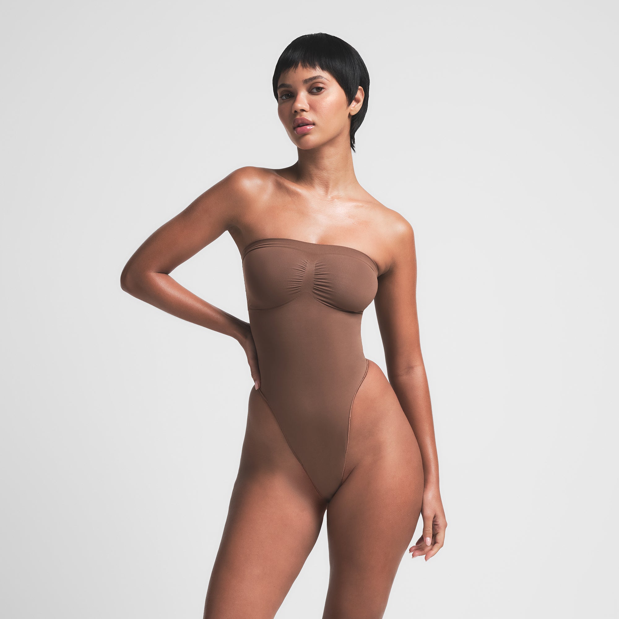 SEAMLESS SCULPT STRAPLESS THONG BODYSUIT | JASPER