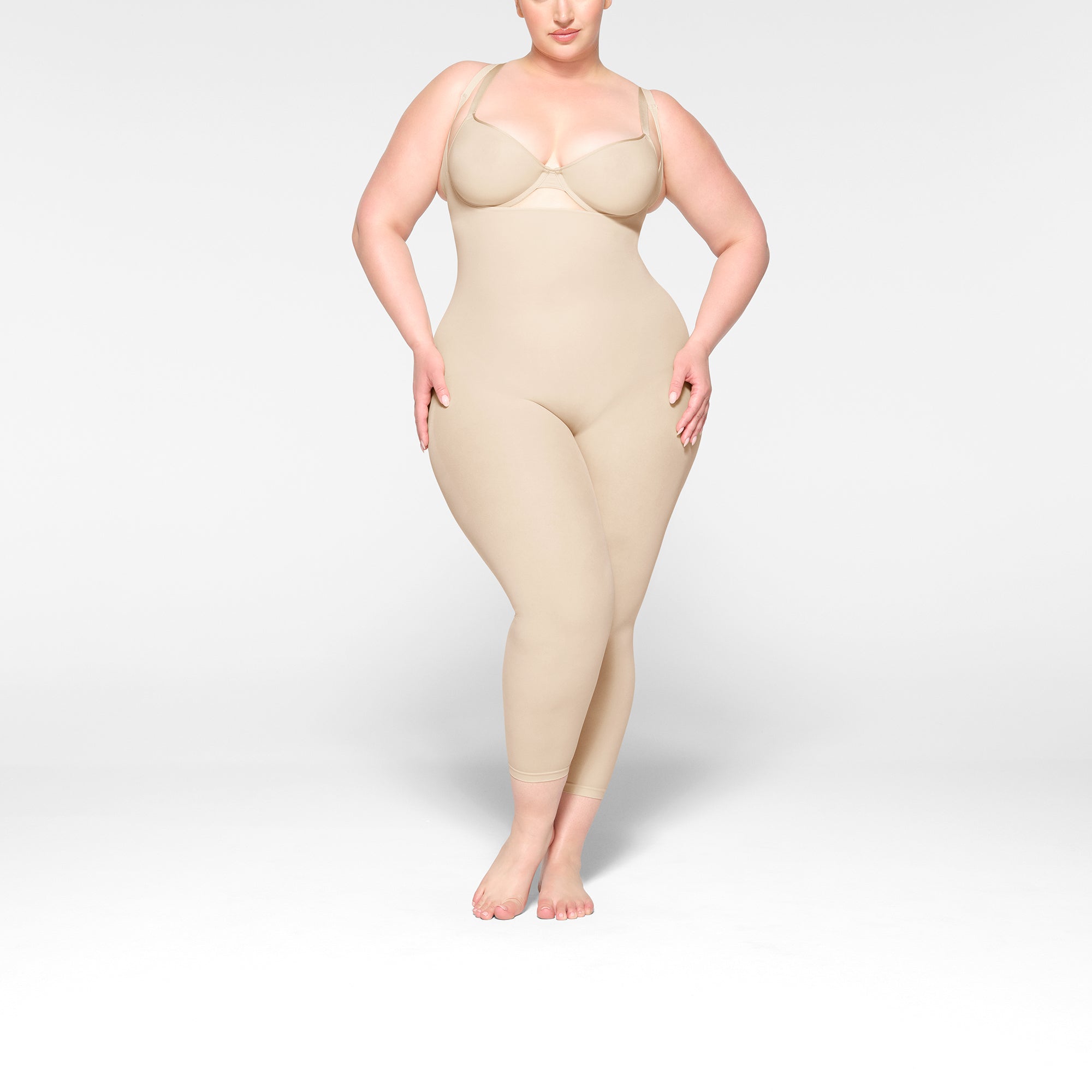 SHEER SEAMLESS OPEN BUST CATSUIT | SAND